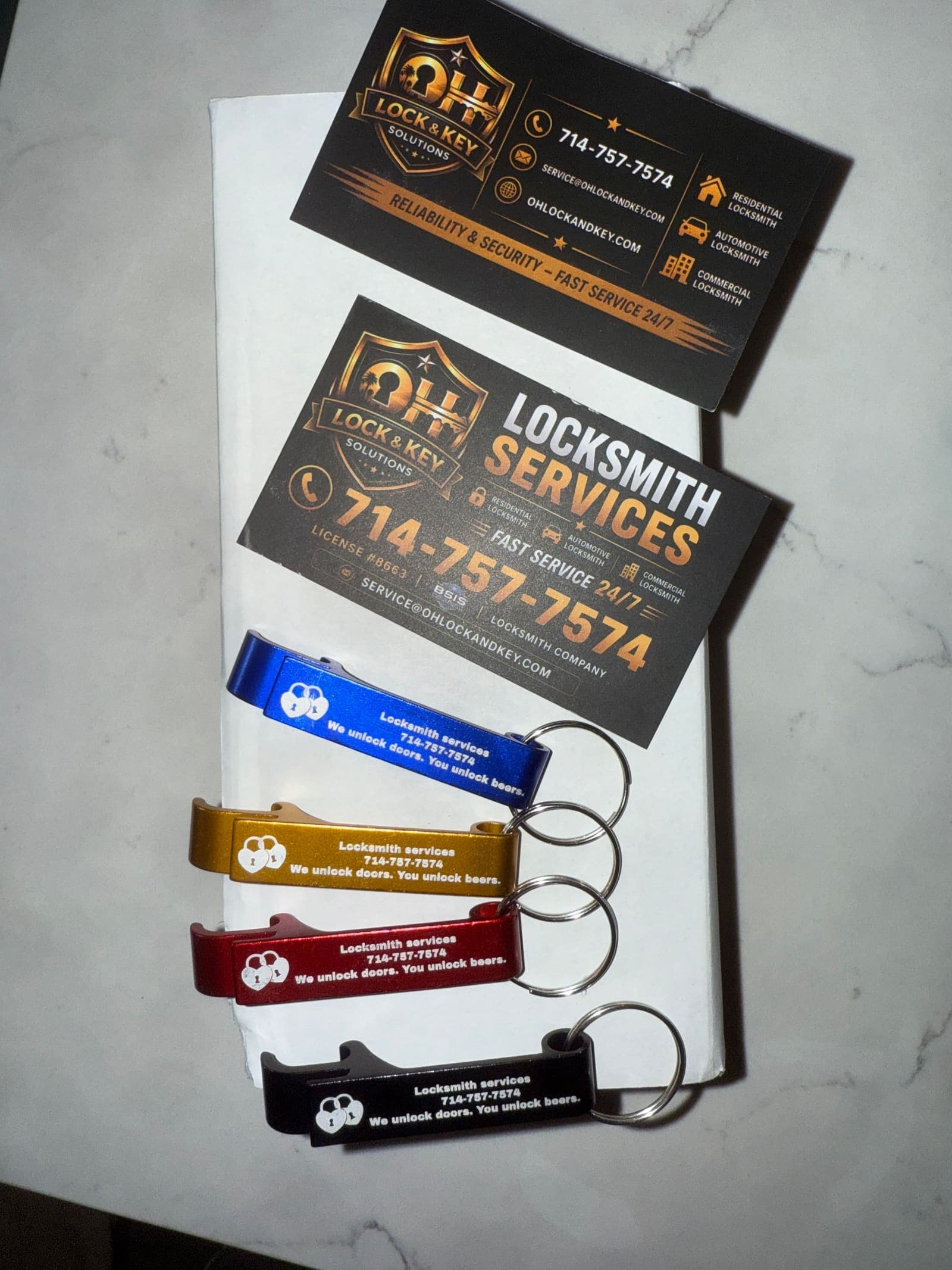 Business cards and keychain bottle openers 01 — OH Lock and Key branding job by OH Lock and Key Solutions, Orange County (BSIS #8663)