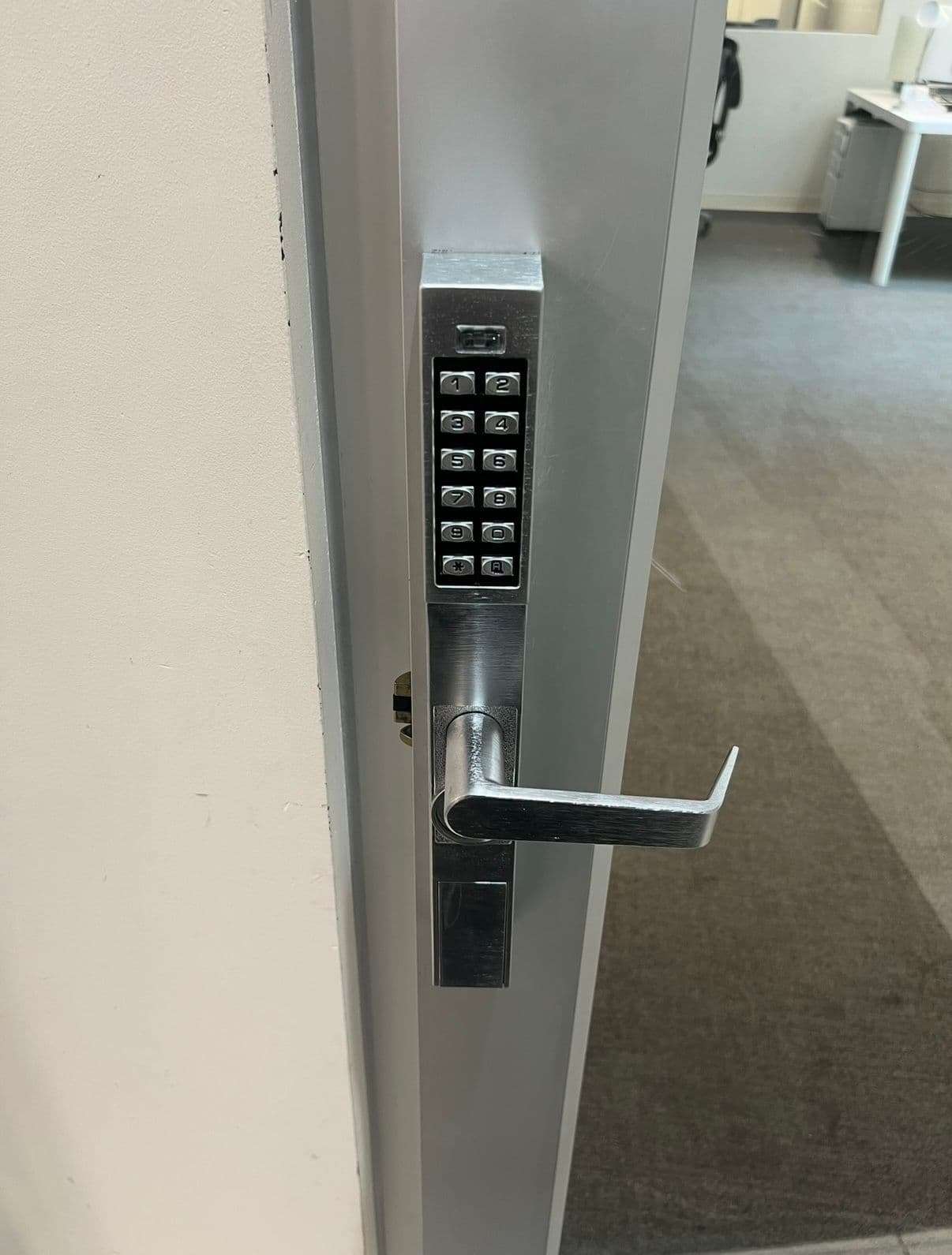 Commercial narrow stile keypad lever — commercial locksmith job by OH Lock and Key Solutions, Orange County (BSIS #8663)