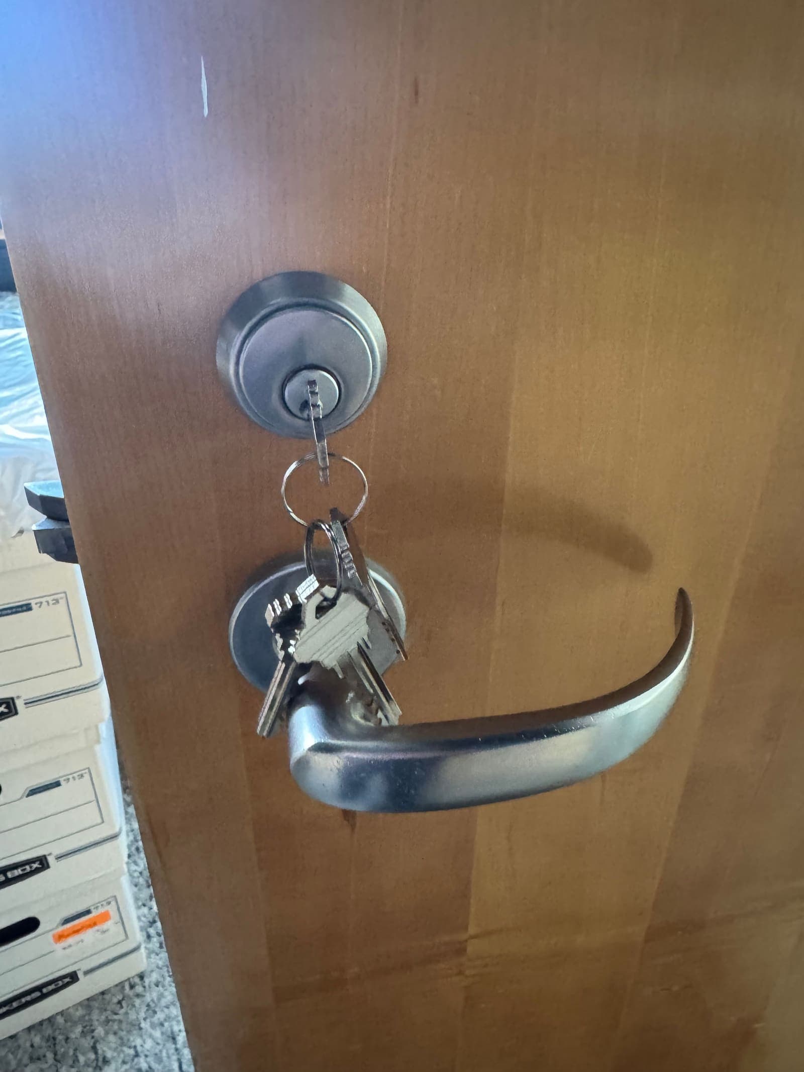 Office deadbolt and lever with new keys — commercial locksmith job by OH Lock and Key Solutions, Orange County (BSIS #8663)