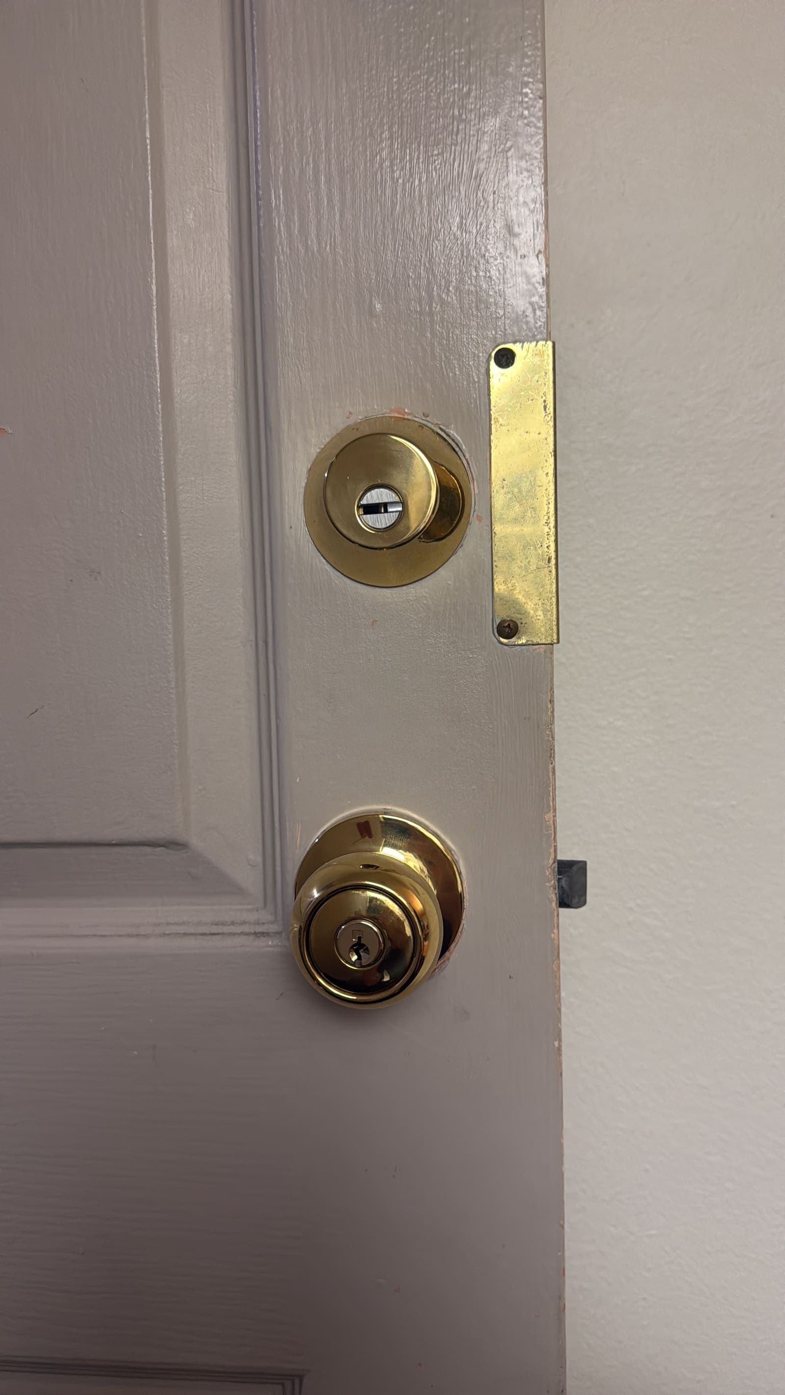 Residential brass deadbolt and knob — residential locksmith job by OH Lock and Key Solutions, Orange County (BSIS #8663)