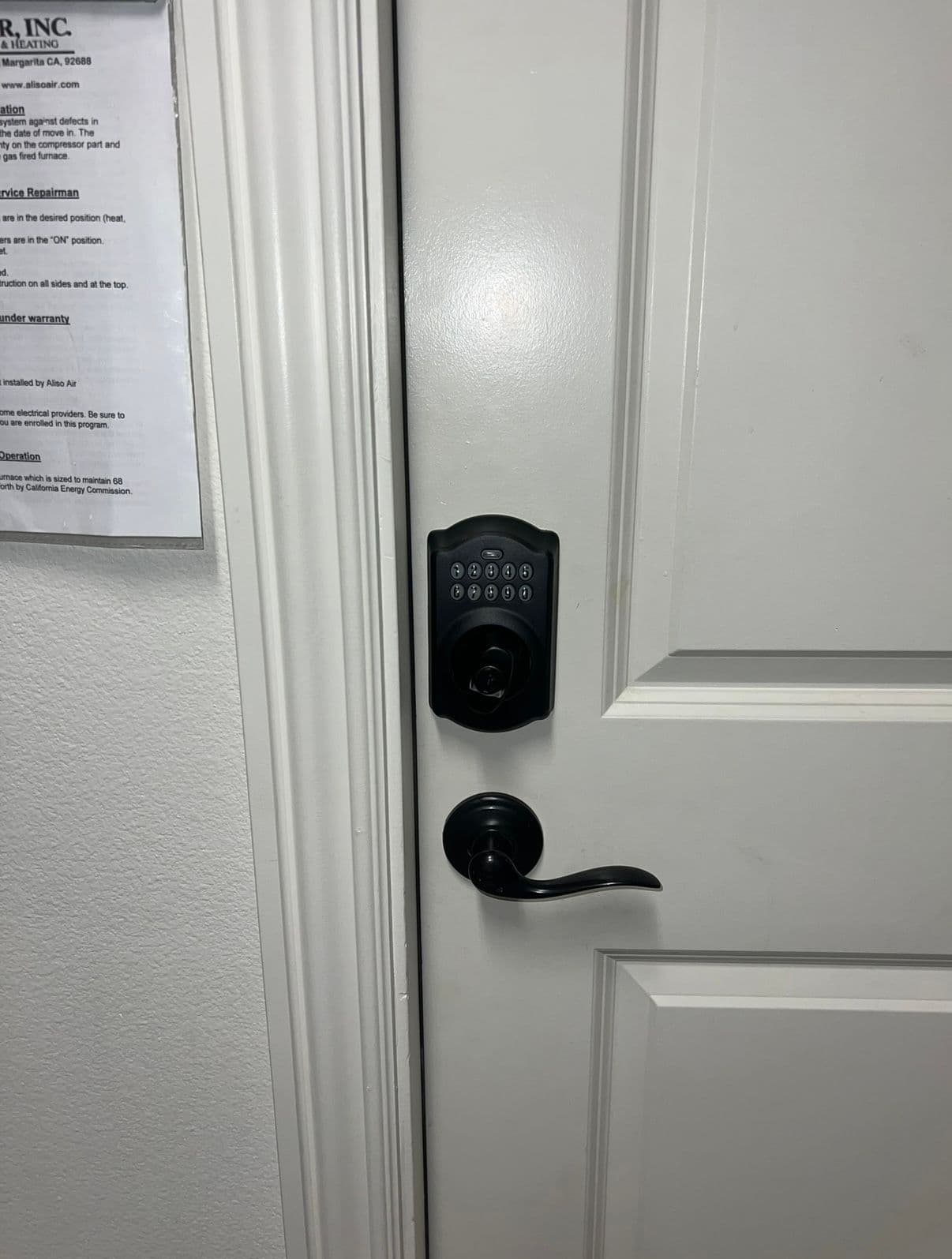 Schlage black keypad deadbolt interior — smart lock install job by OH Lock and Key Solutions, Orange County (BSIS #8663)