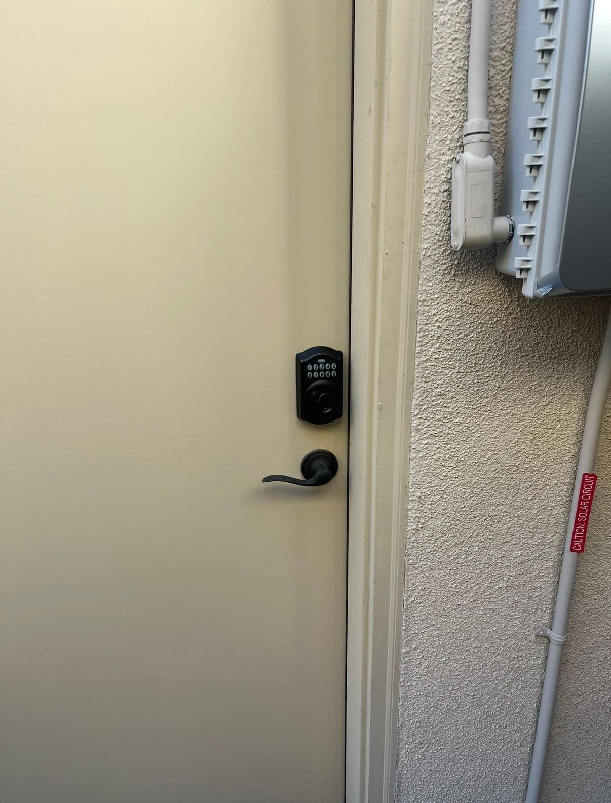 Schlage black keypad deadbolt side door — smart lock install job by OH Lock and Key Solutions, Orange County (BSIS #8663)