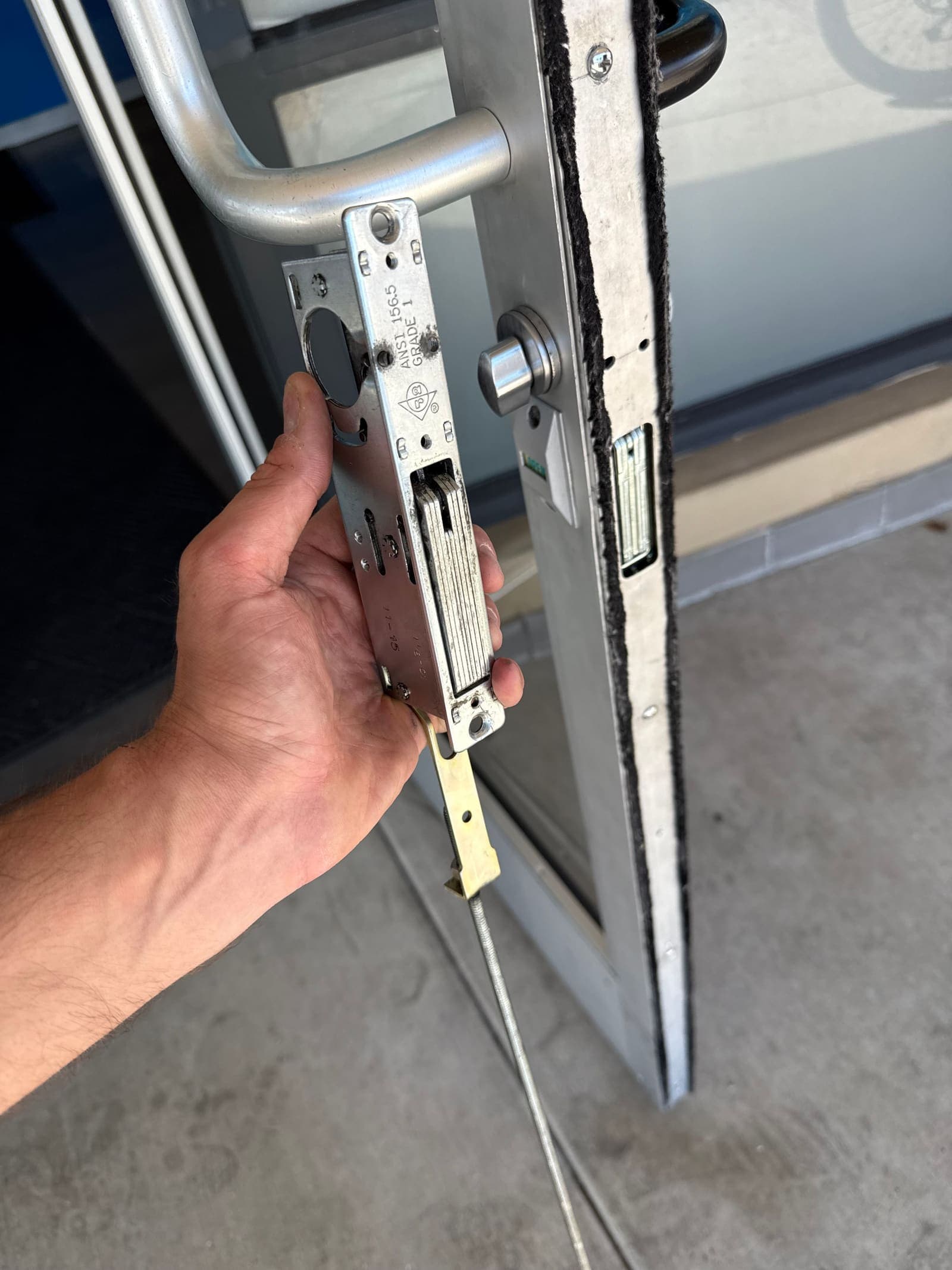 Adams rite mortise lock body replacement — storefront door job by OH Lock and Key Solutions, Orange County (BSIS #8663)