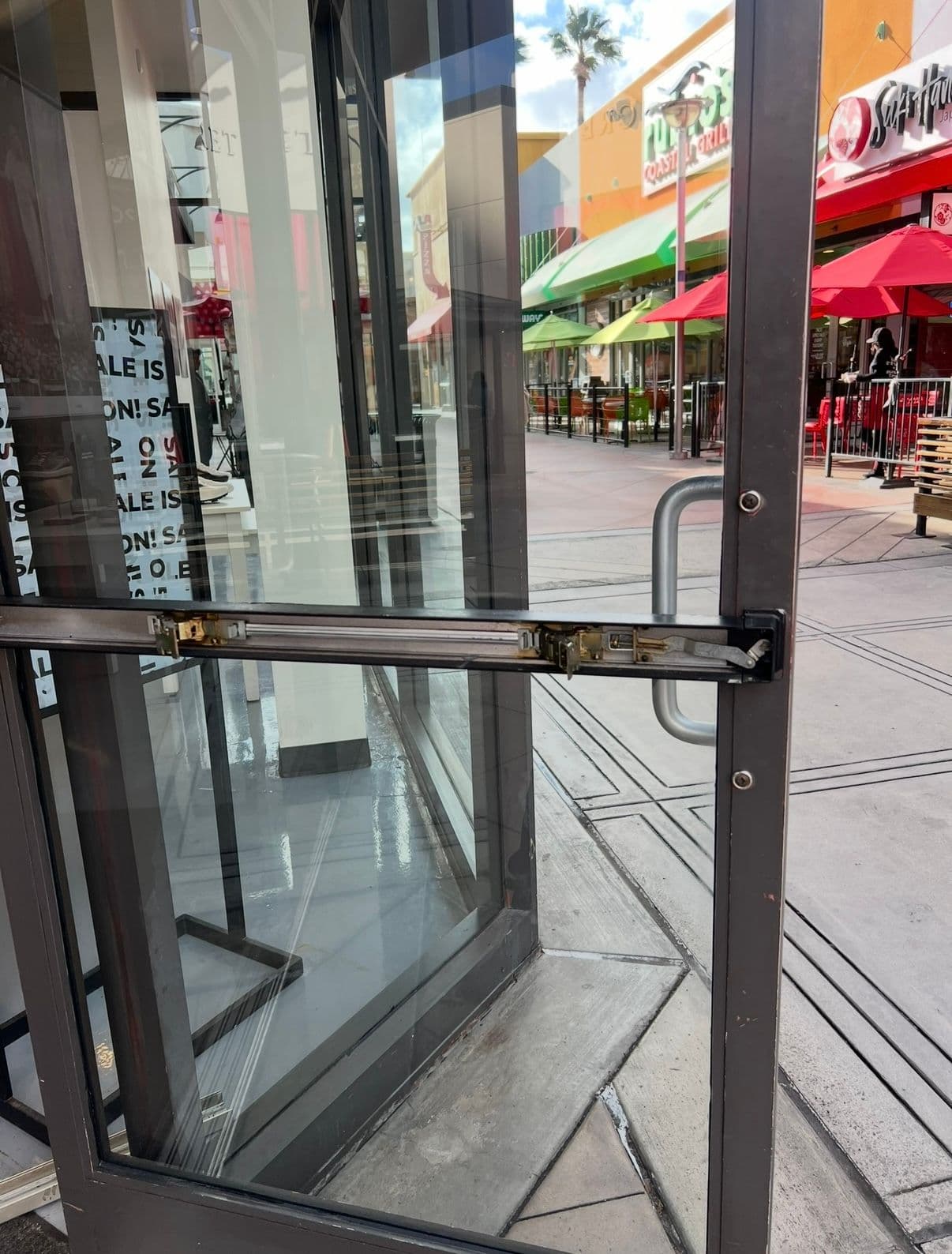 Storefront crossbar panic device service — storefront door job by OH Lock and Key Solutions, Orange County (BSIS #8663)