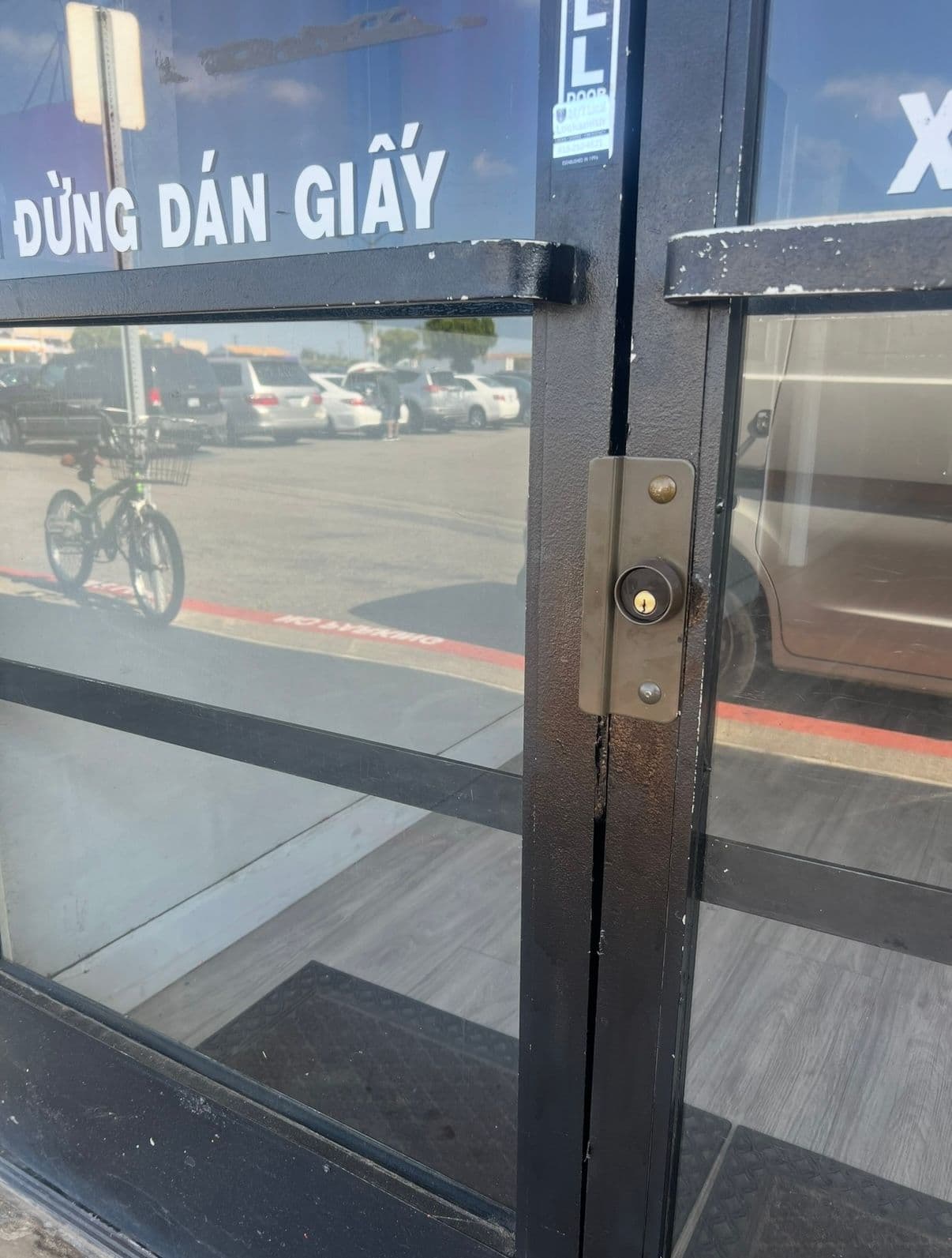 Storefront paddle hookbolt service — storefront door job by OH Lock and Key Solutions, Orange County (BSIS #8663)