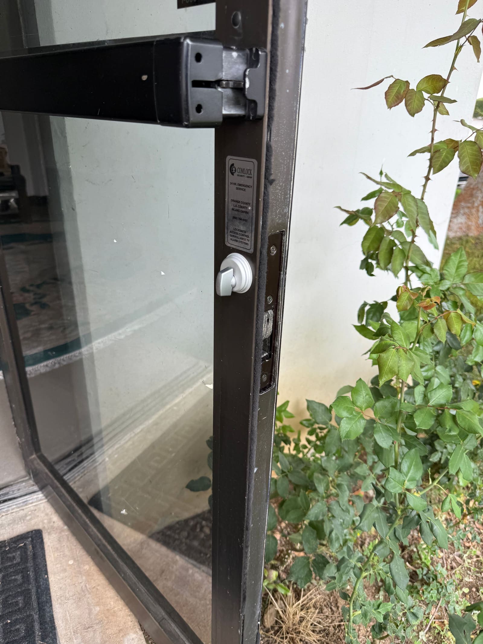 Storefront pivot and mortise service — storefront door job by OH Lock and Key Solutions, Orange County (BSIS #8663)